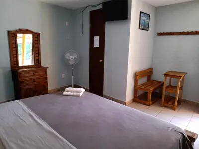 Cama o camas de una habitación en Hospedaje San Antonio Tepoztlán.