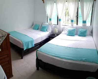 Cama o camas de una habitación en Casa cerca de las Estacas