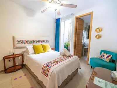 Cama o camas de una habitación en Casa de las Bugambilias B&B