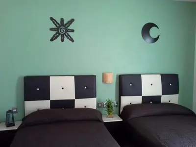 Cama o camas de una habitación en Soleil Inn Atlixco