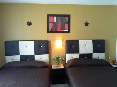 Cama o camas de una habitación en Soleil Inn Atlixco