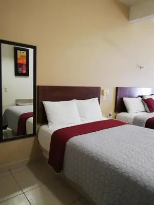 Cama o camas de una habitación en Hotel Nonni