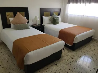 Cama o camas de una habitación en Múcara hotel