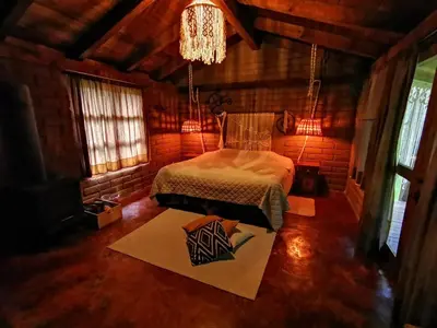 Cama o camas de una habitación en Luchita Mia Eco Cabañas Boutique