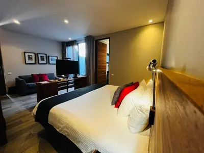 Cama o camas de una habitación en El Callejón Hotel Boutique