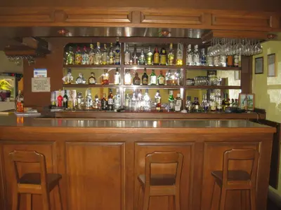El salón o zona de bar de Hotel Posada Andaluz