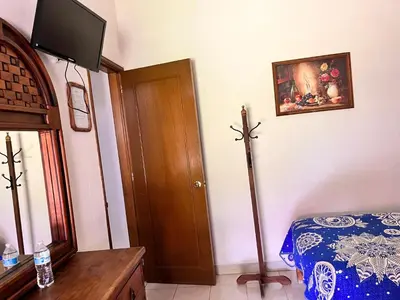 Una televisión o centro de entretenimiento en Hotel Posada Andaluz