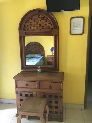 Una televisión o centro de entretenimiento en Hotel Posada Andaluz