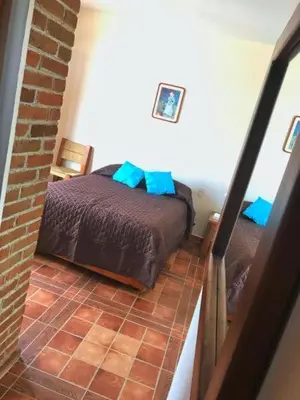 Cama o camas de una habitación en Hostal el Dulce Nombre