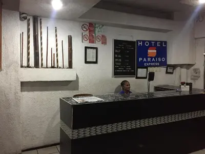 Certificado, premio, señal o documento que está expuesto en Hotel Paraiso Express