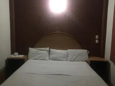 Cama o camas de una habitación en Hotel Paraiso Express