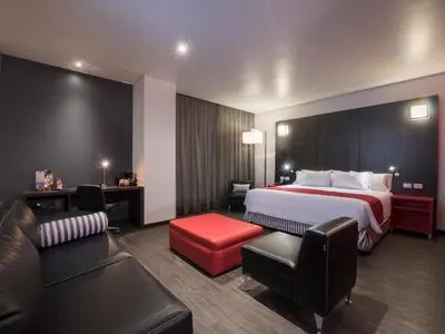 Cama o camas de una habitación en Ramada Encore by Wyndham Puebla