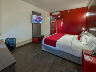 Cama o camas de una habitación en Ramada Encore by Wyndham Puebla