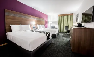 Cama o camas de una habitación en La Quinta by Wyndham San Jose Chiapa Puebla