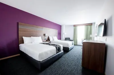 Cama o camas de una habitación en La Quinta by Wyndham San Jose Chiapa Puebla