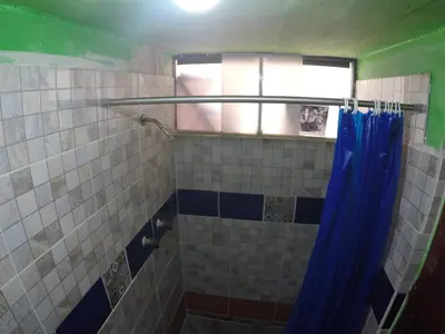 Un baño de Iguana Hostel Oaxaca