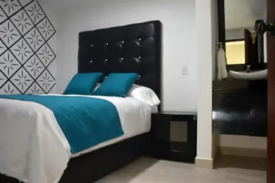 Cama o camas de una habitación en Andrea´s Hotel Boutique