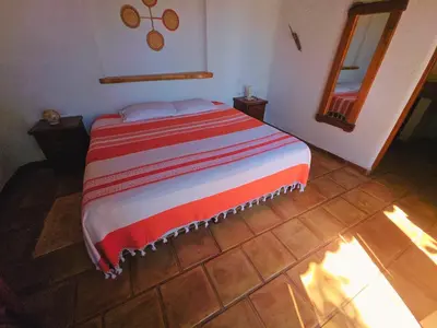 Cama o camas de una habitación en Cabañas el Nido de la Huilota