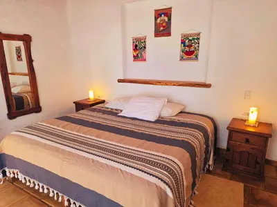 Cama o camas de una habitación en Cabañas el Nido de la Huilota