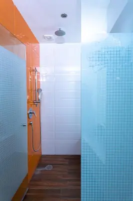 Un baño de Hotel Xcoco Inn