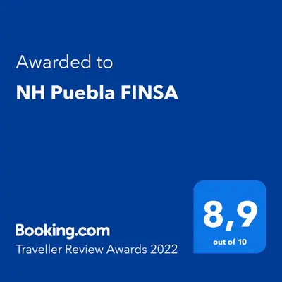 Certificado, premio, señal o documento que está expuesto en NH Puebla FINSA
