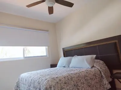 Cama o camas de una habitación en Villa Perfecta Zona Diamante
