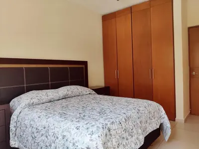 Cama o camas de una habitación en Villa Perfecta Zona Diamante