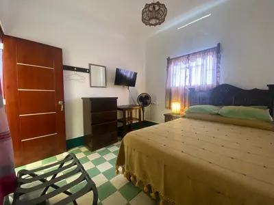 Cama o camas de una habitación en Hostal Mixteco Naba Nandoo