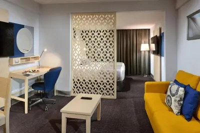 Una televisión o centro de entretenimiento en Gran Hotel de Puebla by HNF