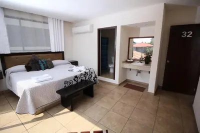 Cama o camas de una habitación en Hotel Sacre