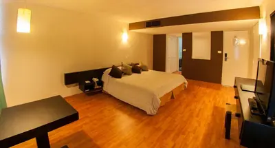 Cama o camas de una habitación en Gran Hotel Xalapa