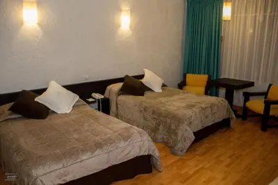 Cama o camas de una habitación en Gran Hotel Xalapa