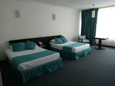 Cama o camas de una habitación en Gran Hotel Xalapa