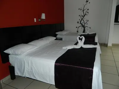 Cama o camas de una habitación en Hotel Terrazas Inn