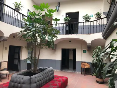 Zona de estar de Hotel Frida
