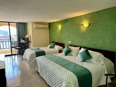 Cama o camas de una habitación en Hotel Bello Cordoba