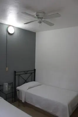 Cama o camas de una habitación en Hotel Casablanca Tuxtla