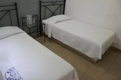 Cama o camas de una habitación en Hotel Casablanca Tuxtla