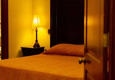Cama o camas de una habitación en Suites Bello Xochimilco
