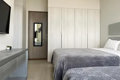 Cama o camas de una habitación en Laviu B&B Luxe Suites