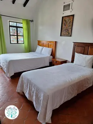Cama o camas de una habitación en Hotel Cielito Lindo, Taxco