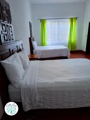 Cama o camas de una habitación en Hotel Cielito Lindo, Taxco