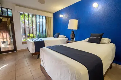 Cama o camas de una habitación en Hotel Mision, Acapulco centro
