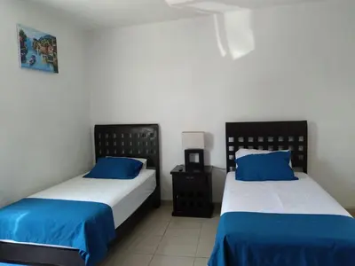 Cama o camas de una habitación en Posada San Cristobal