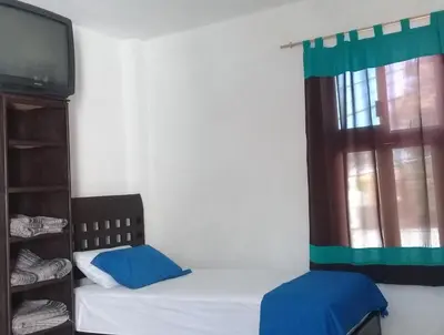 Cama o camas de una habitación en Posada San Cristobal