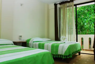 Cama o camas de una habitación en Yuu-Lee Casa Bendita Huatulco