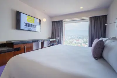 Cama o camas de una habitación en Camino Real Pedregal Mexico