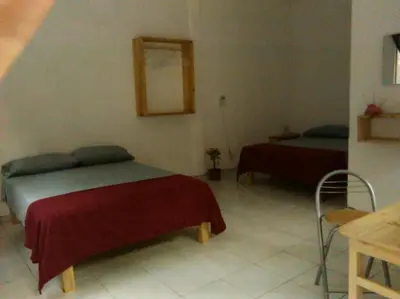 Cama o camas de una habitación en Posada Cielito Lindo