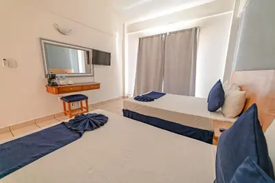 Cama o camas de una habitación en AM Amakal Hotel & Park