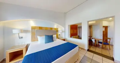 Cama o camas de una habitación en Park Royal Beach Huatulco - All Inclusive